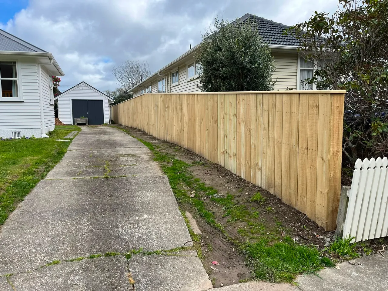 Vertical cedar wooden fence at a Wellington home